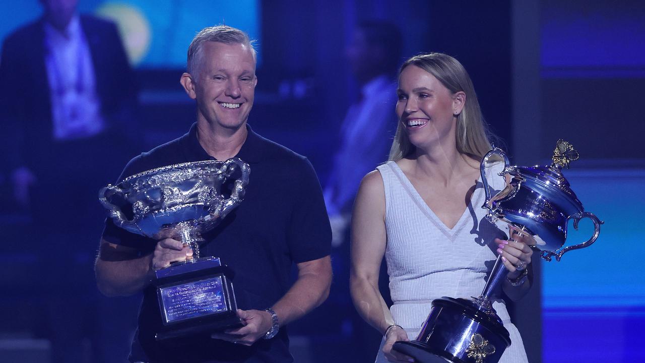 Former champions Thomas Johansson and Caroline Wozniacki deliver the Australian Open trophies. Picture: Mark Stewart