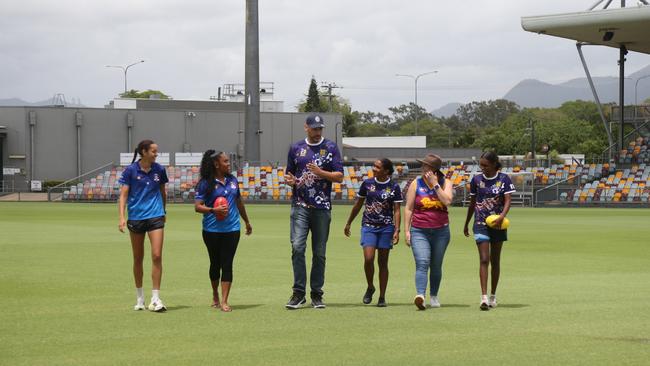 AFL Cape York House boarding supervisor and mentor Tiarna Ahwong, boarding coordinator Sodyla Kris, Labor Leichhardt candidate Matt Smith, Yorke Island student Jessie-Ella Mosby, senator Nita Green and Mornington Island student Shinaya Wilson. Picture: Arun Singh Mann