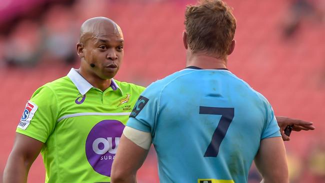 Referee Egon Seconds (L) has blown 31 penalties against two Australian teams. Picture: AFP