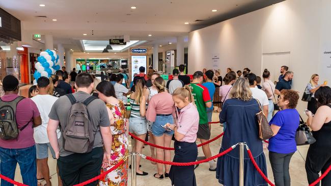 Lines of people wait for a roll. Photo: Bansal Group