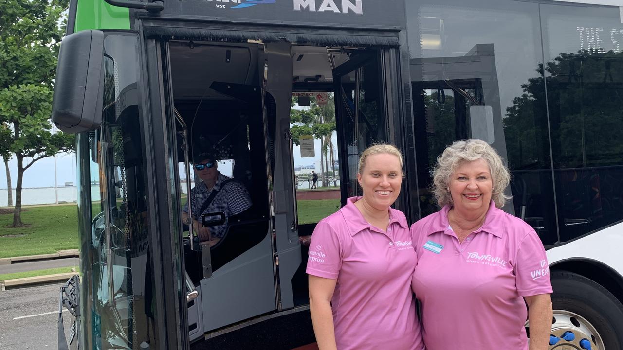 Townsville Enterprise director of visitor economy and marketing Lisa Woolfe and volunteer tour guide Karen Glazebrook were helping cruise ship visitors navigate the city on Monday with the new hop-on, hop-off shuttle bus.