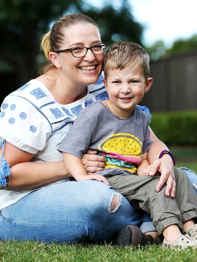 Fred (pictured with his mum Marion Corbett in May) before his treatment.