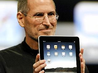 Must-have item: Apple chief Steve Jobs with the iPad