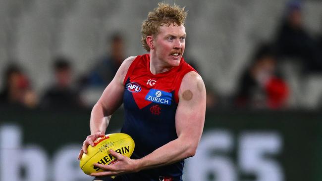 Melbourne coach Simon Goodwin is adamant Clayton Oliver will remain at Melbourne ‘for a long, long time’. Picture: Morgan Hancock / Getty Images