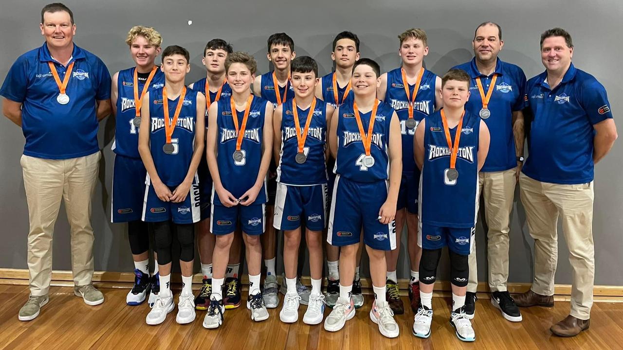 The Rockhampton Rockets players and coaching staff proudly display the silver medals they won at the Australian Under-14 Club Championships in Sydney.