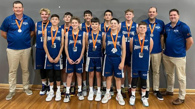 The Rockhampton Rockets players and coaching staff proudly display the silver medals they won at the Australian Under-14 Club Championships in Sydney.