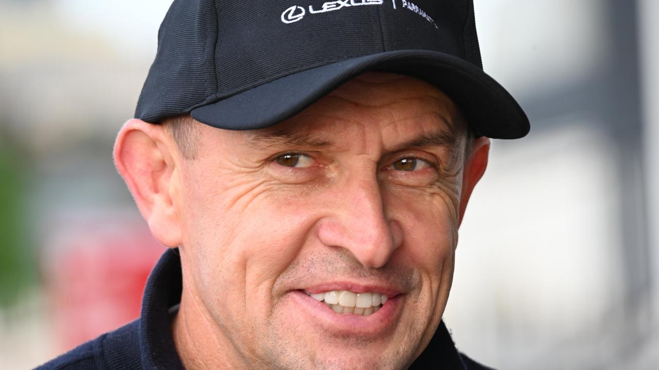 Trainer Chris Waller was all smiles at Flemington trackwork on Friday. Picture: Vince Caligiuri/Getty Images