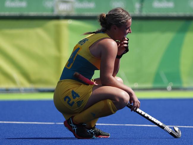 Australia's Mariah Williams pauses inside the pitch after her team lost to New Zealand during a women's field hockey quarter final match atthe 2016 Summer Olympics in Rio de Janeiro, Brazil, Monday, Aug. 15, 2016. (AP Photo/Dario Lopez-Mills)