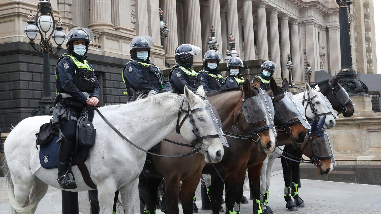 Police on standby at Parliament House in Melbourne for a possible truck convoy protest. Picture: David Crosling
