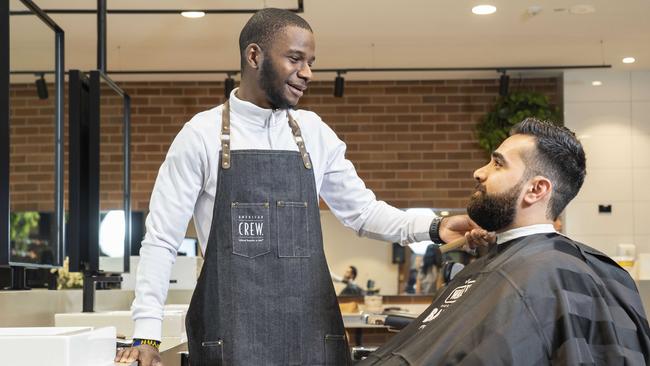 Land at Granville TAFE was also sold off. Granville TAFE's new hairdressing/barber facilities on campus. Student Khalid Nassor training in the new facility with Esho Dawood (in chair). (AAP/Image Matthew Vasilescu)