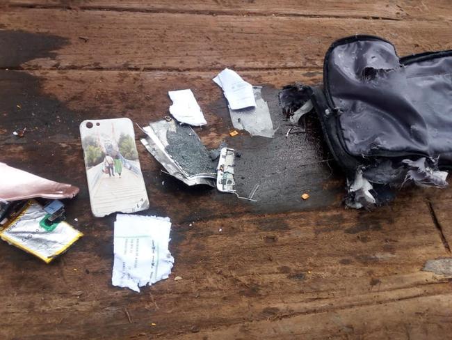 Personal items recovered after the crash. Picture: AFP/Pertamina Hulu Energy