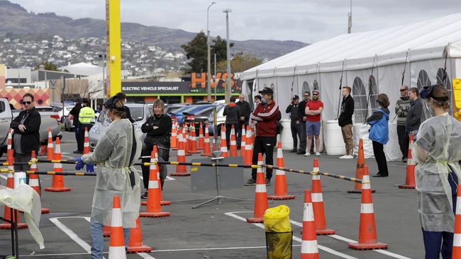 Shoppers line up at a pop-up community COVID-19 testing station in Christchurch, New Zealand. Picture: AP.