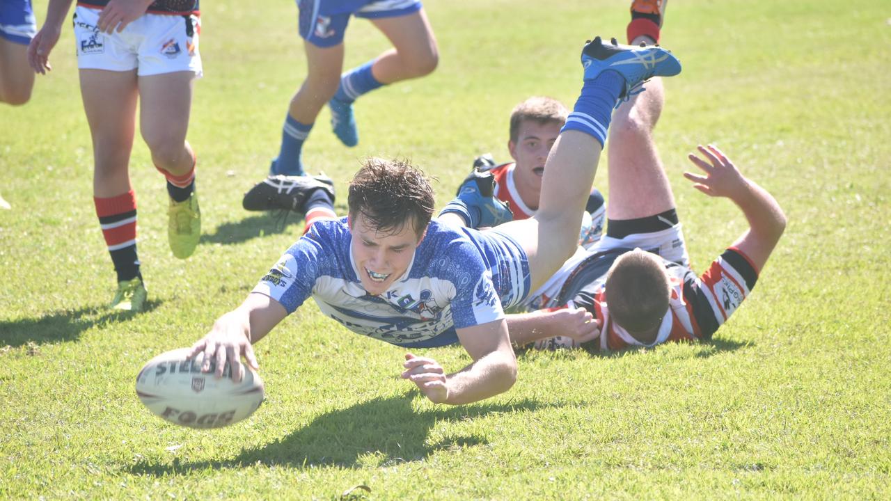 Sean Bourke scores a try for Ignatius Park against St Patrick's College in the Aaron Payne Cup in Mackay, 20 July 2021. Picture: Matthew Forrest