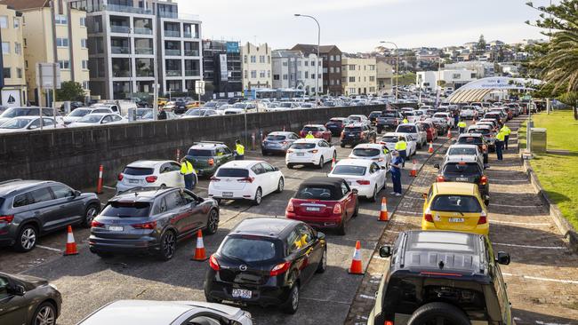 A drive-through Covid-19 testing centre with long lines stretching along Campbell Parade at Bondi Beach, eastern Sydney, on Wednesday. Picture: Getty Images