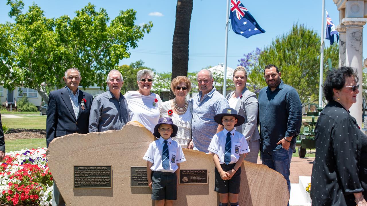 The family of Private Jack Boyd, who was a World War Two prisoner of War, at the new plaque at the Gatton Cenotaph. Photo: Ali Kuchel