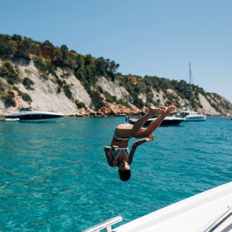 Ruby Rose somersaults off a yacht while on holiday in Ibiza. Picture: Ruby Rose/Instagram