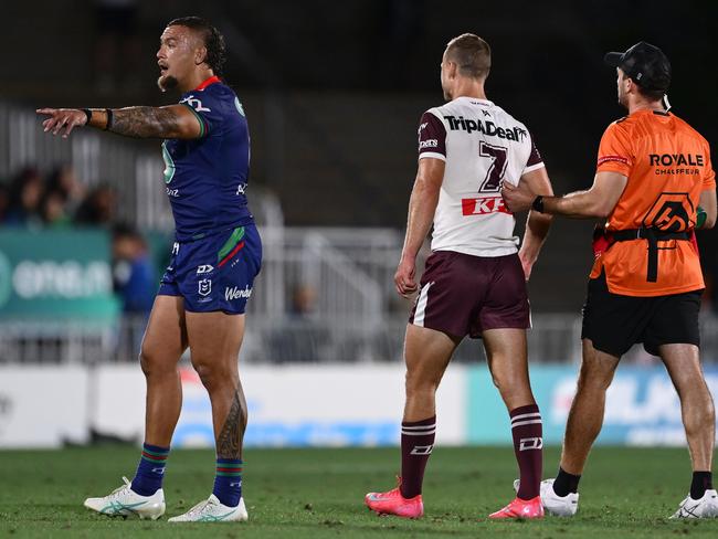 Daly Cherry-Evans is assisted from the field. Picture: Hannah Peters/Getty Images