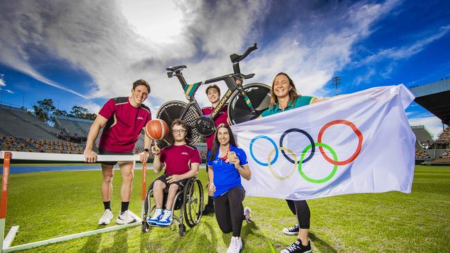 Former Olympic swimmer Brooke Hanson, right, with, from left, decathlete Liam Gilbert, wheelchair basketballer Lachlin Synot, track cyclist Ryan Elliott and paracyclist Paige Greco. Picture: Nigel Hallett