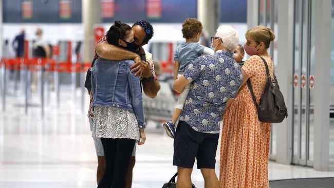 Passengers arrive from Sydney into Brisbane Airport. Picture: NCA NewsWire/Tertius Pickard