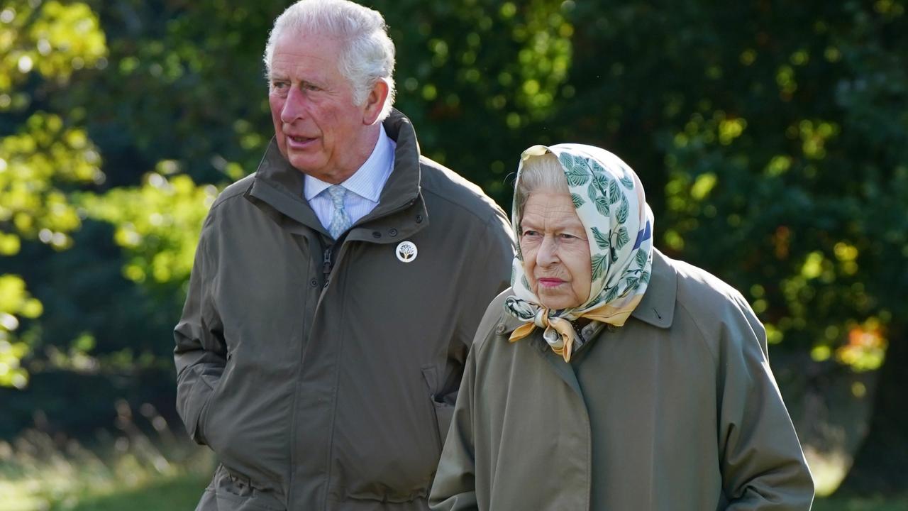 Queen Elizabeth II and Prince Charles, Prince of Wales walk together. Picture: Andrew Milligan-WPA Pool/Getty Images