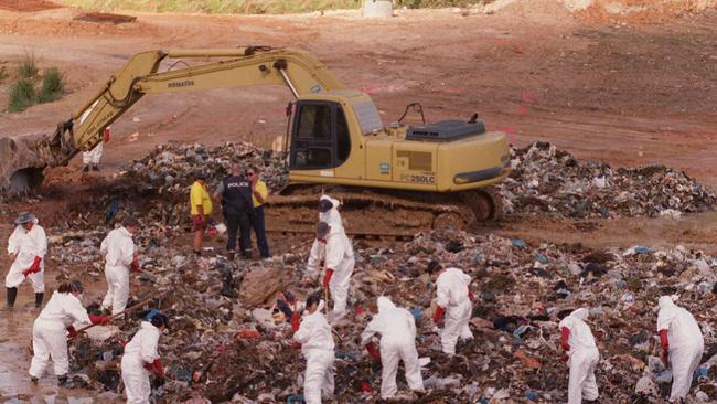 MAY 24, 1999: Police search through rubbish at Labrador tip.