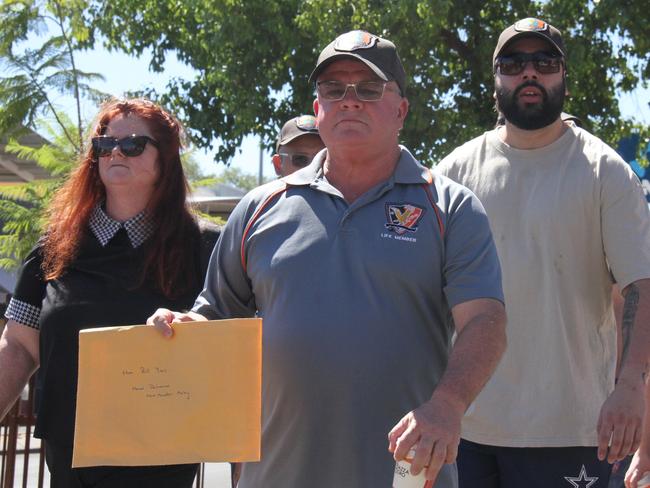 United Workers Union NT branch secretary Erina Early and unionised NT corrections officers descended on NT Treasurer Bill Yanâs office in Alice Springs on Friday, February 21 2025, with a letter demanding NT Corrections Commissioner Matthew Varley stand down. Picture: Gera Kazakov