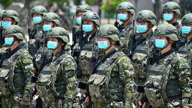 Soldiers in at a base in Tainan, souther Taiwan, stand at attention during an address by president Tsai Ing-wen in April. Picture: AFP