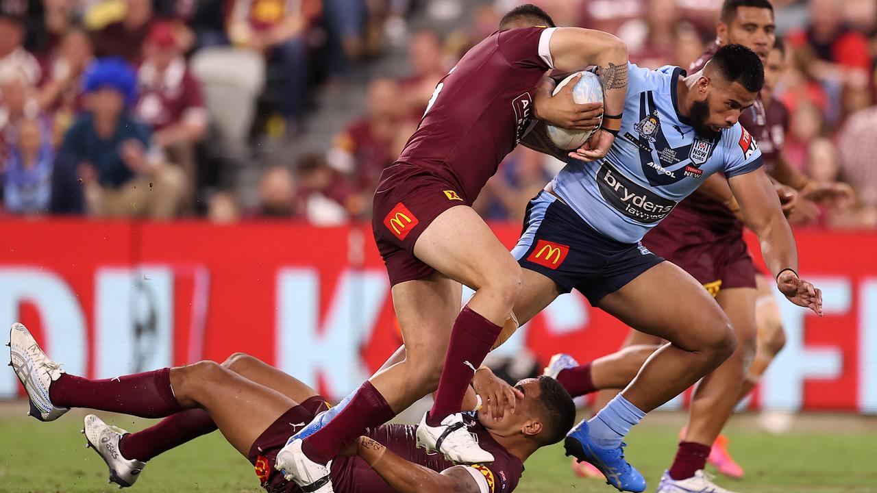 Payne Haas crashes through the Maroons defence during Origin I in Townsville on his way to 143 running metres. Picture: Mark Kolbe/Getty Images