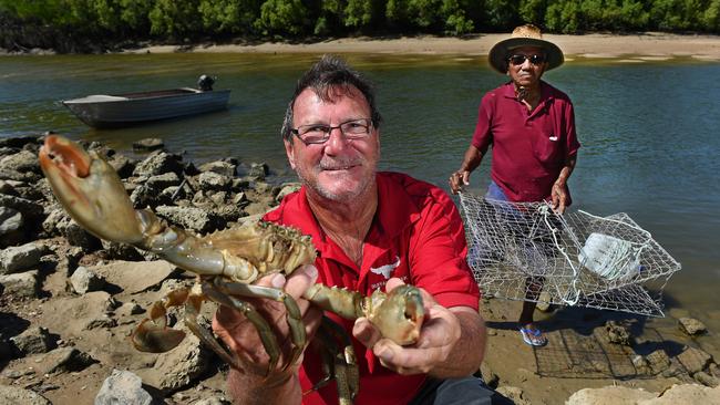 Mad keen mud crabbers, Ray Medlicott, 63, and mate Sammie Kassman, 80, enjoy the spoils of Buffalo Creek. PICTURE: Patrina Malone