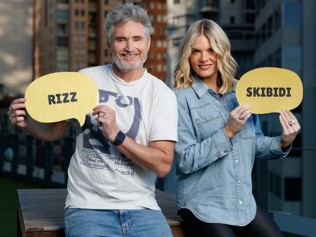 DAILY TELEGRAPH. EMBARGOED FOR SUN 21 JULY, DO NOT USE PRIOR. Preview for the Prime MinisterÃs Spelling Bee. 2Day FM radio hosts Dave ÃHughesyÃ Hughes and Erin Molan pose on the stationÃs balcony at World Square. Monday 15/07/2024. Picture by Max Mason-Hubers