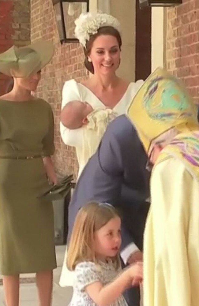 Kate and Meghan watch on as Princess Charlotte introduces herself to the Archbishop of Canterbury. Picture: ITV