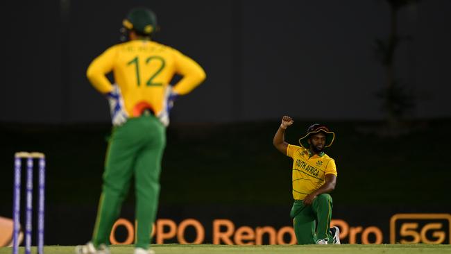 South Africa captain Temba Bavuma takes the knee. Photo by Gareth Copley-ICC/ICC via Getty Images