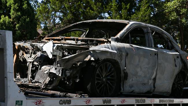 The burnt out car being removed from Welfare street in Beverly Hills. Picture: Gaye Gerard / NewsWire