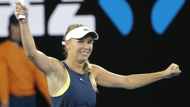 Caroline Wozniacki celebrates after beating Carla Suarez Navarro in their quarter-final. Picture: AP