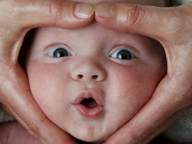 30/07/2009 NEWS: Baby Massage Week preview. 9 week old Joshua Spaulding surprised at how good his mum Rachel can massage, during a Baby massage class.   HS25