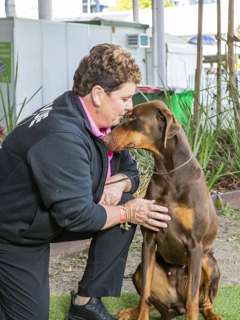 Rhonda Harnell with Jaffa the Doberman at the Ekka at the RNA Showgrounds in Bowen Hills on Thursday. Picture: Richard Walker