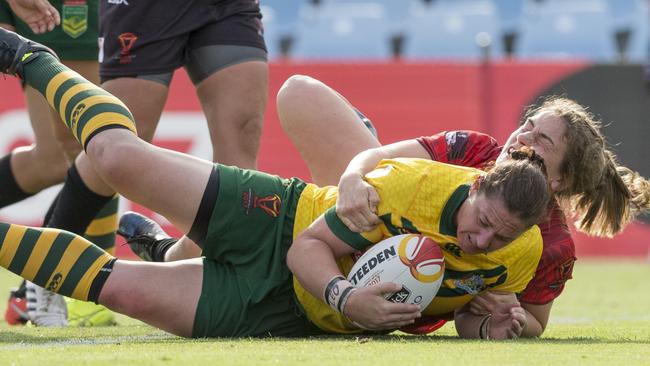 Steph Hancock scores a try for the Jillaroos in their semi-final clash with Canada.