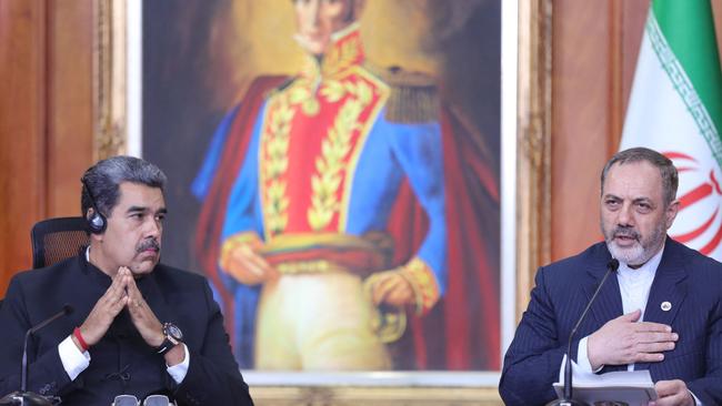 Venezuelan President Nicolas Maduro (L) with Iran's Defence Minister, Brigadier General Aziz Nasirzadeh, during a meeting at the Miraflores Presidential Palace in Caracas. Picture: AFP.