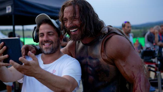 Super-size me ... director Brett Ratner on set with Johnson.