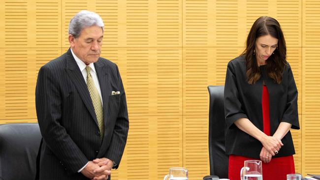 Jacinda Ardern and Deputy PM Winston Peters observed a minutes silence today. Picture: Hagen Hopkins/AFP