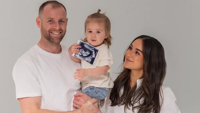 Sam Docherty and wife Natalie with daughter Ruby.