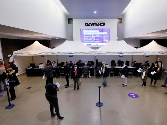 People line up to be vaccinated at the Stade de France, in Saint-Denis, outside Paris. Picture: AFP