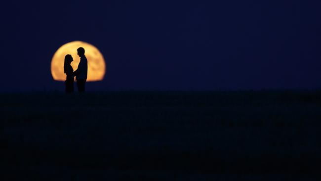 How romantic: The moon in Burgos on Tuesday. AFP PHOTO / CESAR MANSO