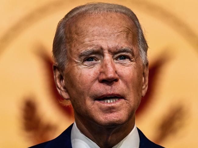 (FILES) In this file photo US President-elect Joe Biden delivers a Thanksgiving address at the Queen Theatre in Wilmington, Delaware, on November 25, 2020. - US President-elect Joe Biden will insist Iran agrees to new demands if it wants the US to return to a nuclear deal and lift sanctions, The New York Times said on December 2, 2020. The Times said the Biden administration would seek to extend the duration of "restrictions on Iran's production of fissile material that could be used to make a (nuclear) bomb" in a new round of negotiations. (Photo by Chandan KHANNA / AFP)