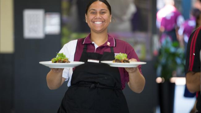 Service with a smile Misty Bayer helps out Maitre d’ Caitlyn Carr.