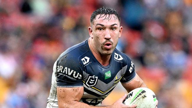 BRISBANE, AUSTRALIA - MAY 07: Reece Robson of the Cowboys runs with the ball during the round 10 NRL match between Sydney Roosters and North Queensland Cowboys at Suncorp Stadium on May 07, 2023 in Brisbane, Australia. (Photo by Bradley Kanaris/Getty Images)