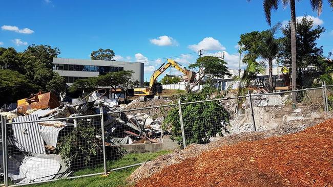 The cottage is reduced to a pile of twisted iron and rubble.