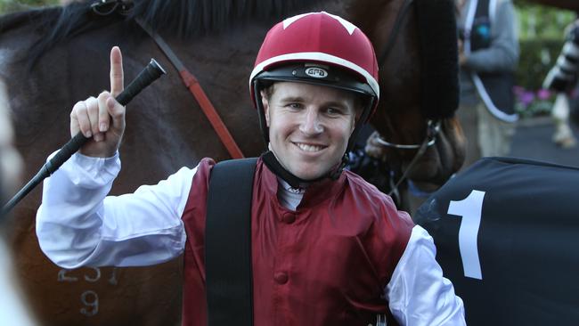 Tommy Berry celebrates his Golden Rose triumph with the Peter Snowden-trained Epaulette.