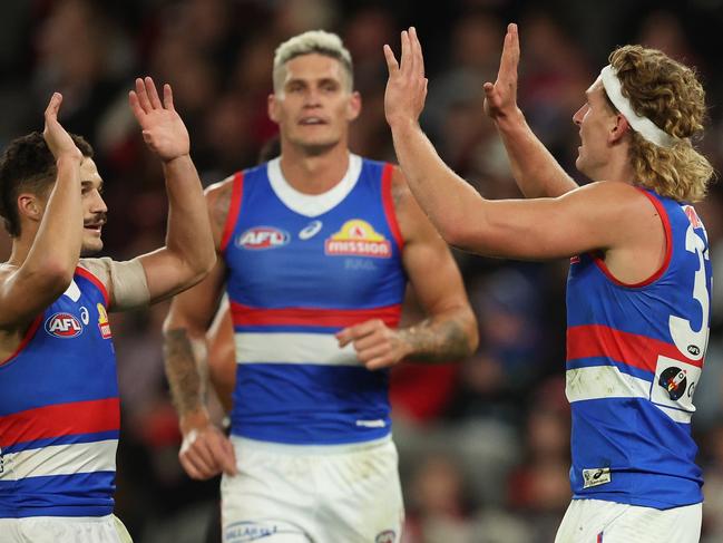 MELBOURNE, AUSTRALIA - APRIL 18: Aaron Naughton of the Bulldogs celebrates after scoring a goal during the round six AFL match between St Kilda Saints and Western Bulldogs at Marvel Stadium, on April 18, 2024, in Melbourne, Australia. (Photo by Robert Cianflone/Getty Images)