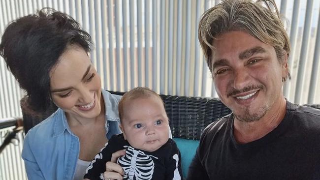 John Ibrahim and partner Sarah Budge with their son Elvis.